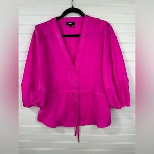 DKNY women’s hot pink satin 3/4 sleeve peplum blouse with deep v neck. Size Med